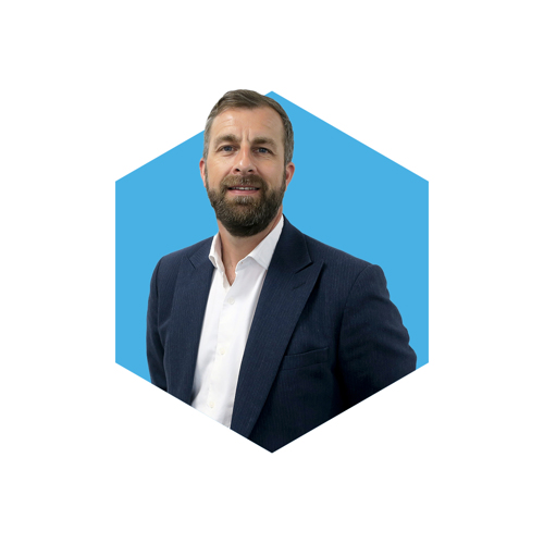 Chris Ford portrait photo on blue hexagon